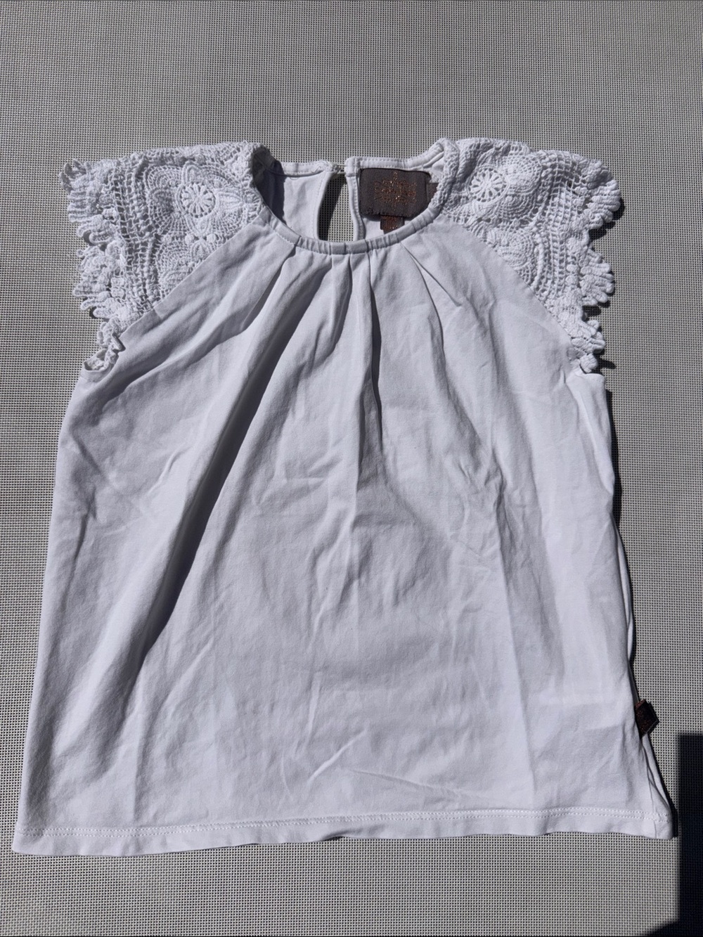 Creamie girls’ white crochet-sleeve top